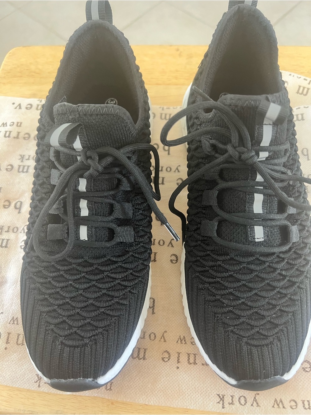 bernie mev. black knit lace-up sneaker with orange logo